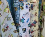 rolls of fabric with children's prints