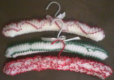 3 knitted coat hangers