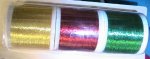 spools of gold,red and green metallic sewing thread