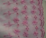 White cotton with pink cut out embrodery