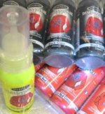 flourescent red and yellow and black fabric paint in applicator
