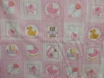 pink squares with rattle, rubber duck, cradle, letters