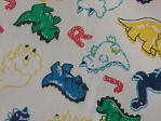 Dinosaurs with yellow green blue alphabet