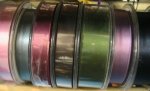rolls of pink, silver, brown,green, mauve satin Ribbons